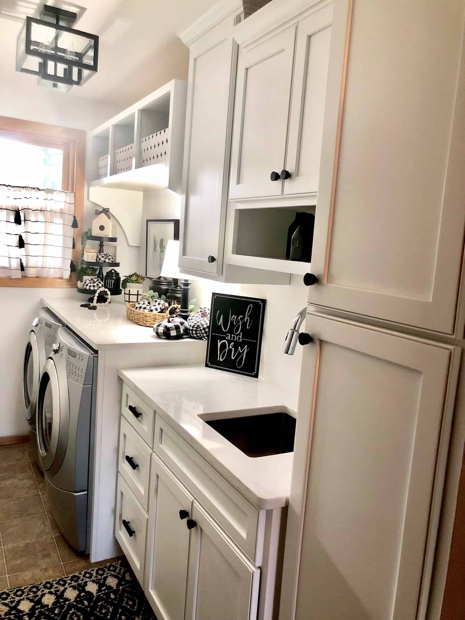 White laundry room in Rae Dunn style