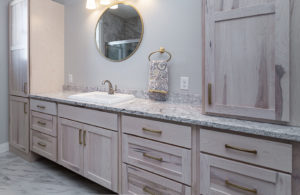 master bathroom maple cabinetry with quartz