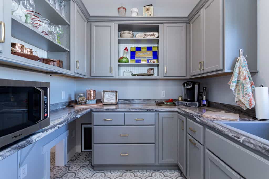 Gray cabinets in walk-in pantry