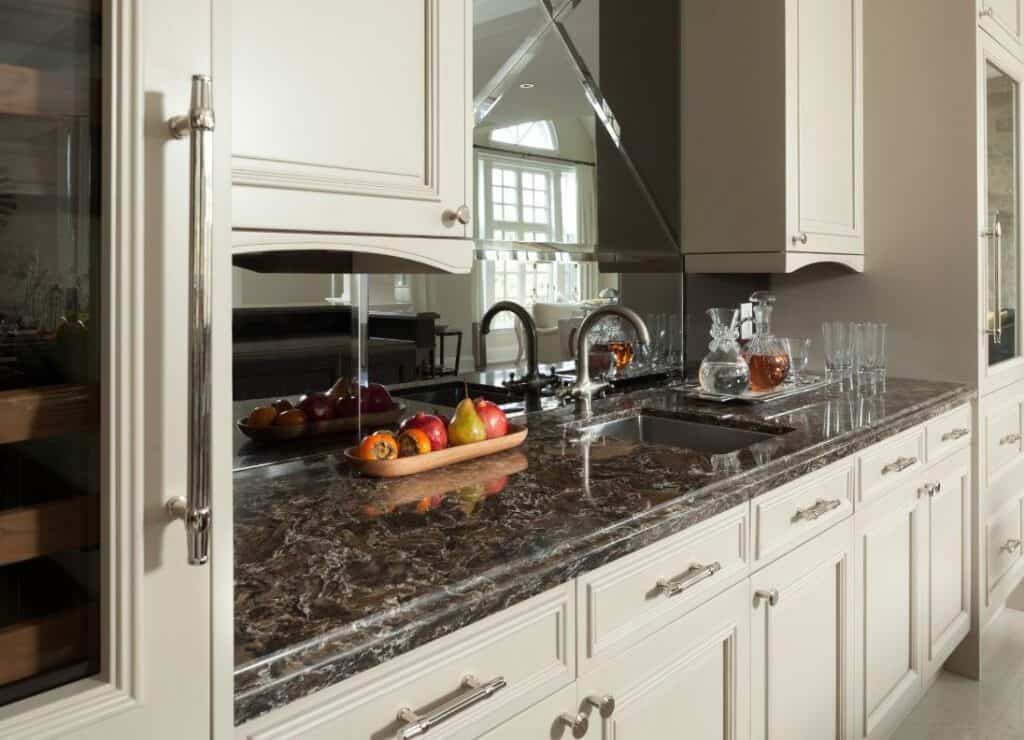 wet bar highlights kitchen with chrome hardware