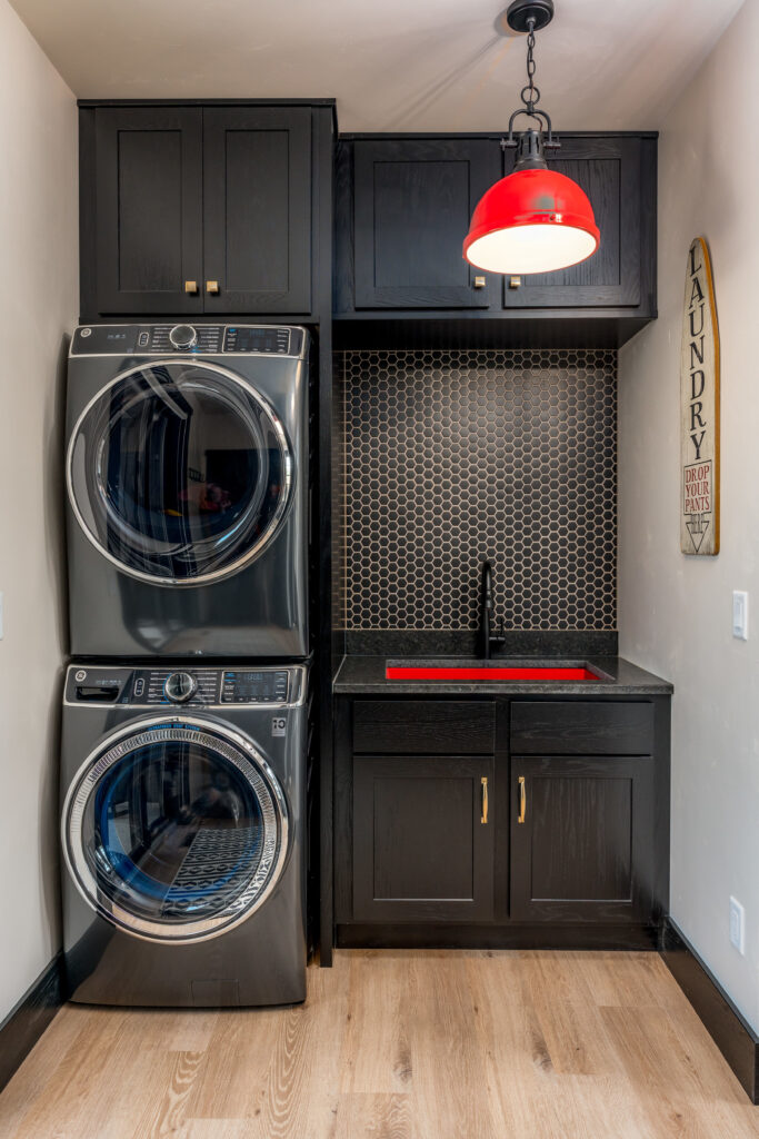 Black oak cabinets in the laundry room