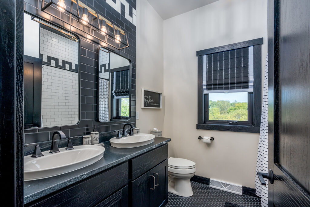 Black Bathroom vanity with double oval sinks